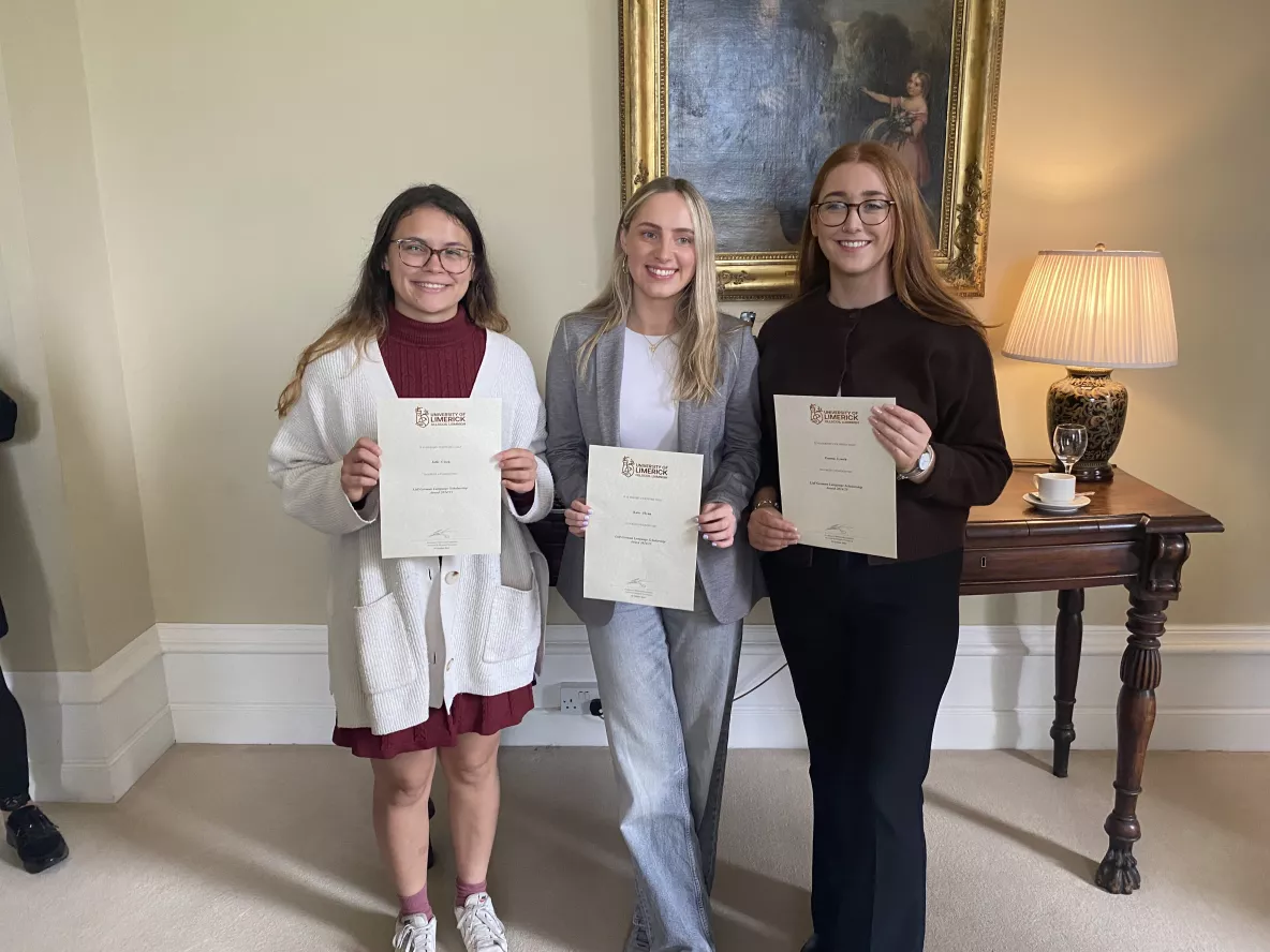 Kate Flynn, Emma Lynch and Julie Cizek holding their Lidl scholarships