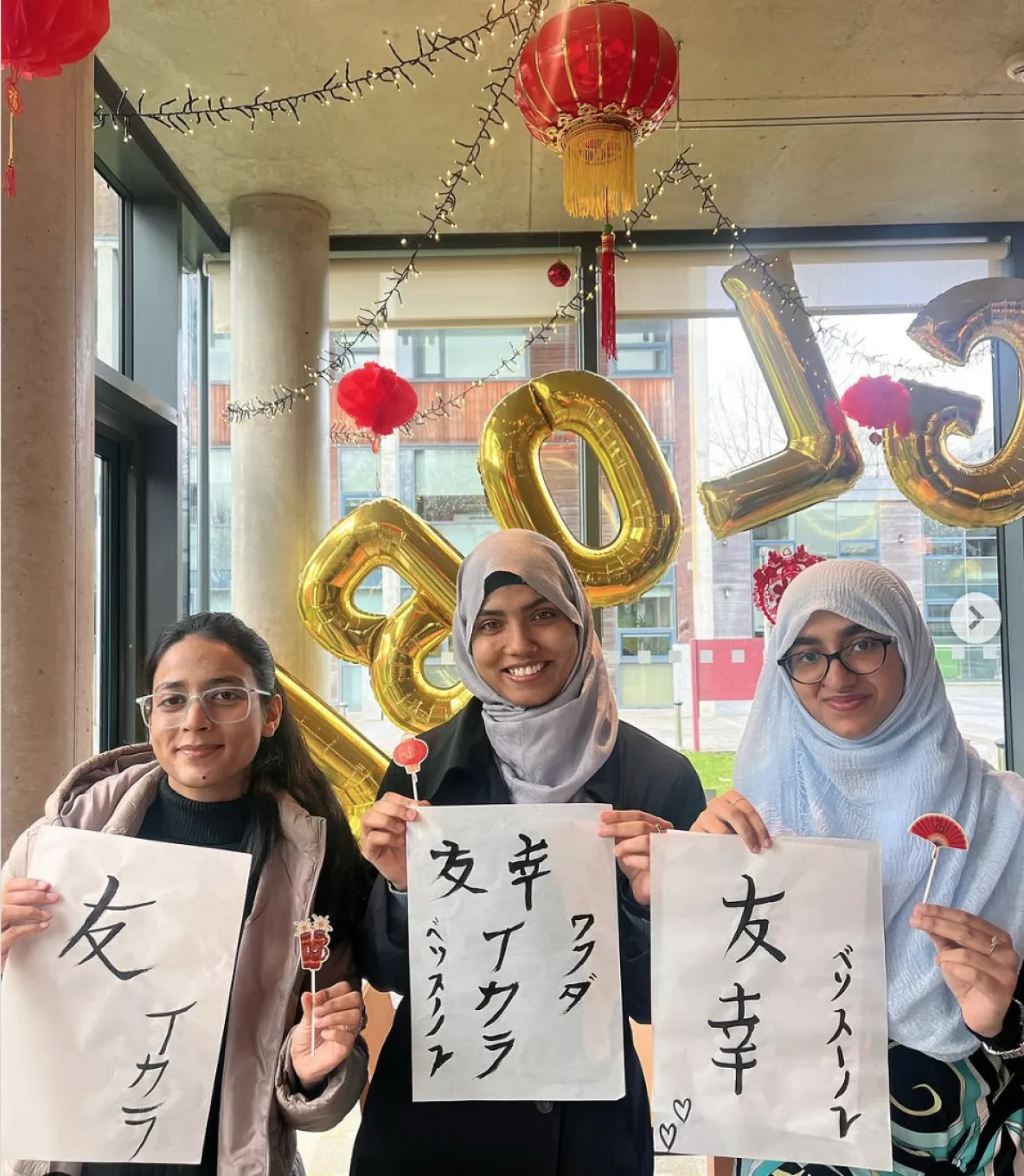 Three students next to each other 