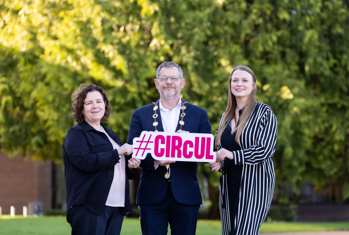 Sandra Joyce, Mayor John Moran and Laura Keyes pictured at the launch - outside on the UL campus holding a sign that says CIRcUL