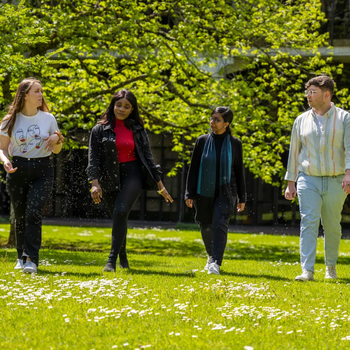 Students walking on a green