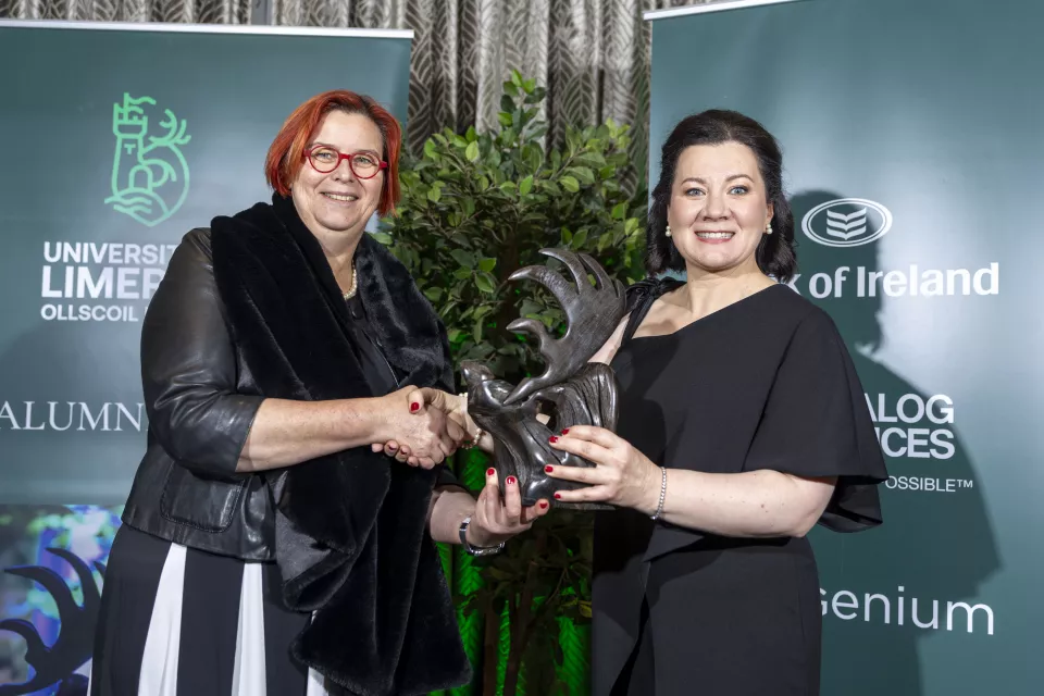 UL President presenting Imelda Hurley with her UL Alumni Award