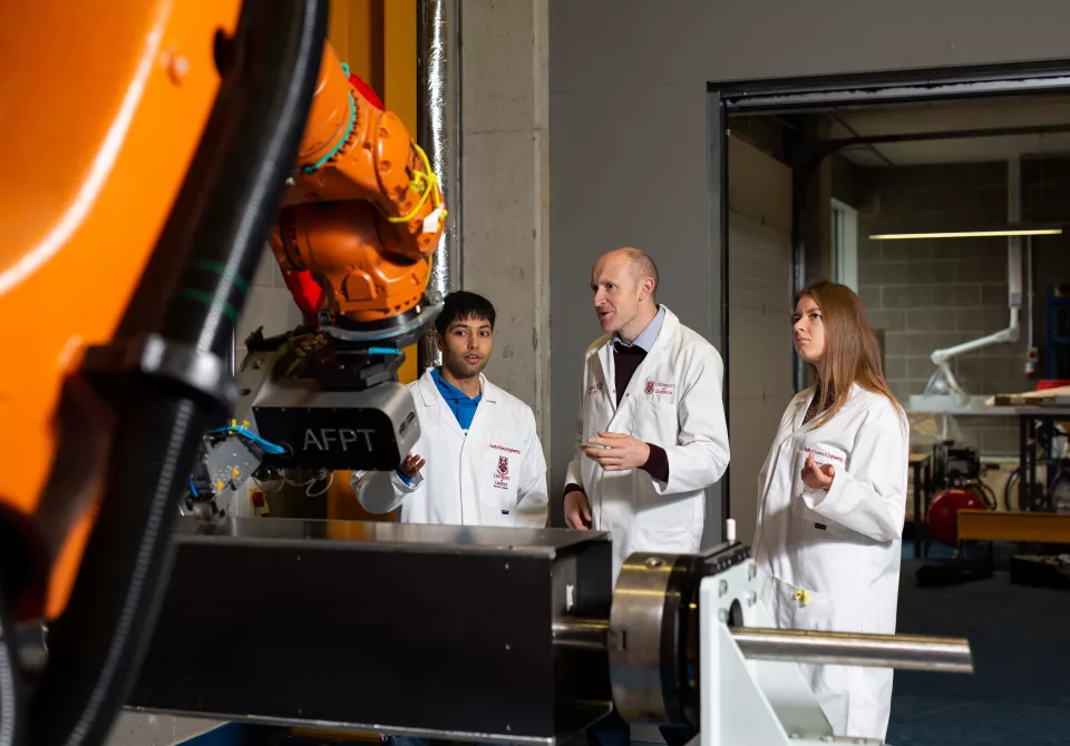 Students in a lab with a lecturer