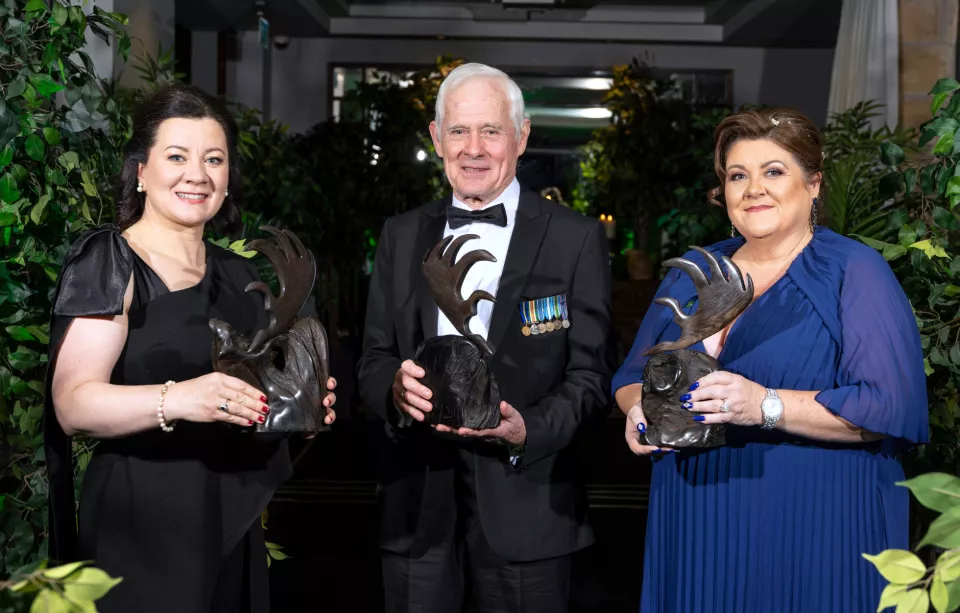 2022 UL Alumni Award Recipients holding their awards