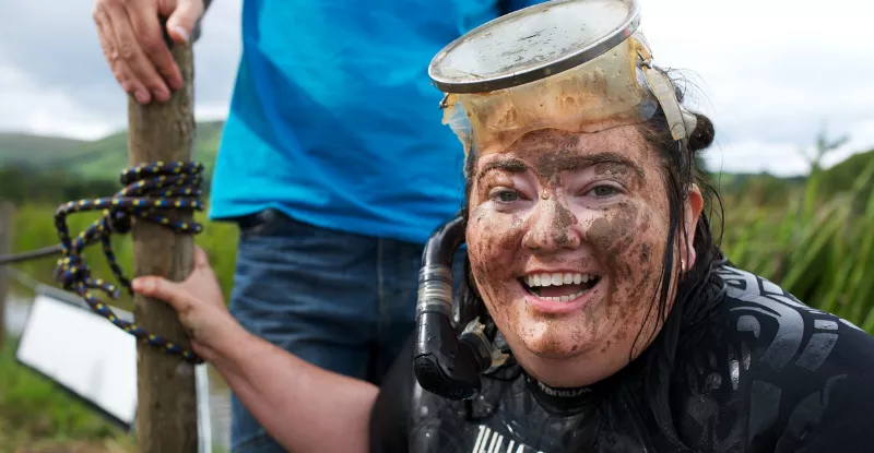 Julia Galvin laughing in a bog