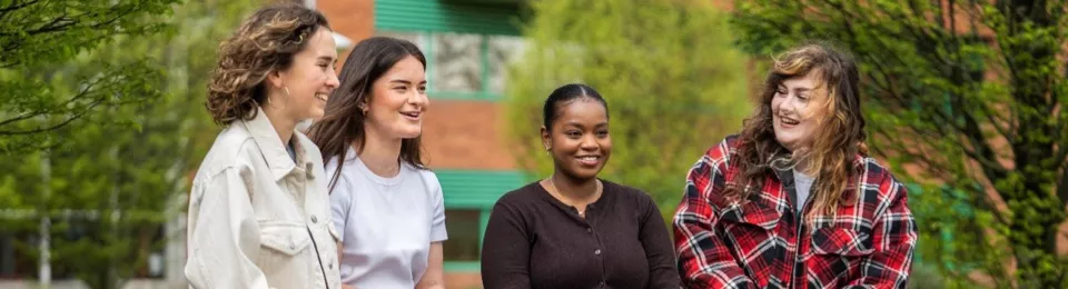 4 female students on campus